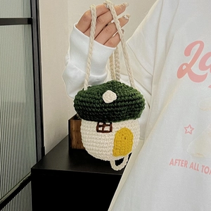 Handmade mushroom house crochet crossbody bag in green and cream knit with strap