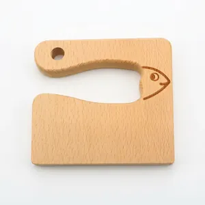Handcrafted wooden children kitchen knife with fish carving for fruit and vegetables