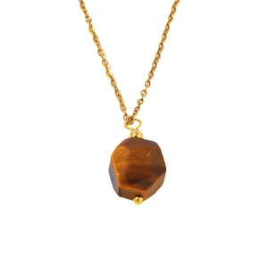 Minimalist golden necklace featuring an irregular brown tiger eye stone pendant on white background