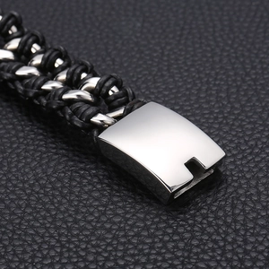 Men's polished stainless steel Cuban chain woven black leather cord bracelet