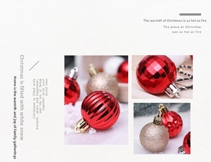 Detail of red and gold Christmas ornaments with textured finishes for tree decoration