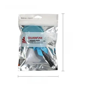 Detail showing dimensions of the soft blue powder puff in transparent packaging