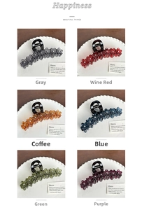 Detail showing variety of colors for large floral claw clips with rhinestone centers