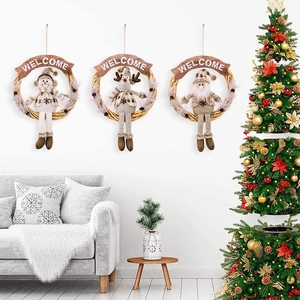Three Christmas wreaths with snowman, reindeer, and Santa Claus plus Welcome signs