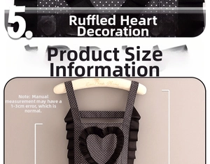 Close-up of black polka dot canvas apron with heart ruffle detail and slim straps