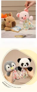 Close-up of cute plush animal pendants with floral outfits showing soft texture