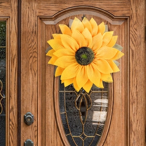 Handmade sunflower wreath for door decor with yellow mesh petals and dark center