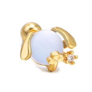Macro detail of gold helix stud with light blue bead and white zircon floral accent