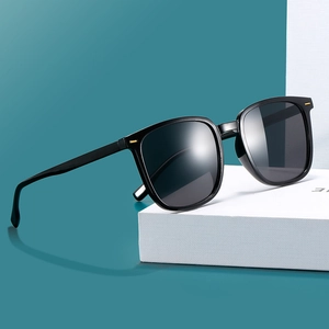 Classic retro black square frame sunglasses with golden metal accents for men and women