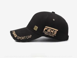 Side view of black baseball cap featuring golden FBXS embroidery and metal badge accent