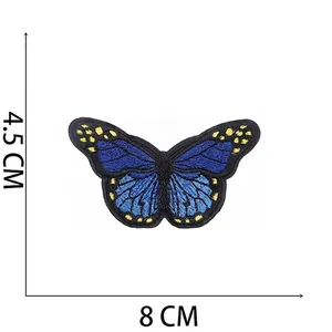 Size detail of blue and black butterfly embroidery patch with 8cm width and 4.5cm height