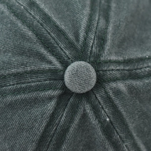 Top view of washed charcoal baseball cap with green stitching and six-panel crown detail