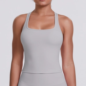 Close-up of the square neck and fitted structure on a light gray yoga tank top for women