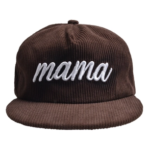 Detailed close-up of brown corduroy baseball cap with white mama embroidery