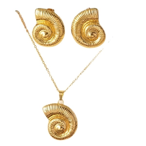 Golden nautilus seashell jewelry set with matching pendant necklace and stud earrings