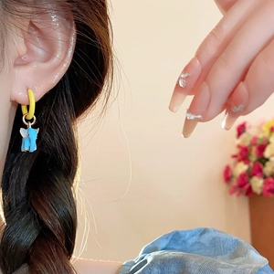 Minimalist blue elephant pendant hoop earrings for women in polished gold finish