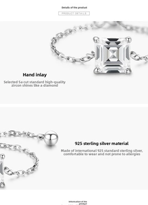 Vue détaillée d'une bague en argent S925 avec zircon carré et éléments de chaîne