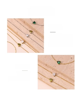 Macro detail of heart-shaped gemstone jewelry with vacuum plating and polished finish