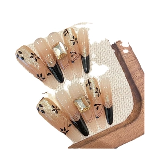 Cat eye press-on nails with autumn maple design, gold gradients and crystal rhinestones