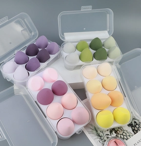 Eight-piece soft makeup sponge set in clear storage box with teardrop and slanted designs