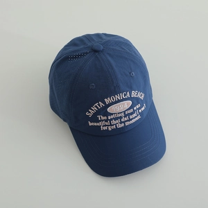 Close-up of navy blue breathable baseball cap with Santa Monica Beach embroidery