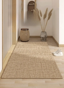 Detail of crystal velvet door mat with woven texture in a minimalist Japanese home setting