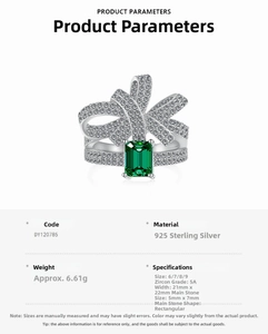 Detailed macro view of S925 silver ring with green emerald-cut zircon and bow design