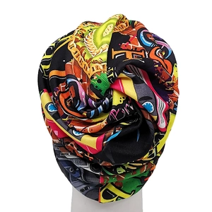 Detail of high-elasticity neck gaiter with vibrant street style graffiti print patterns