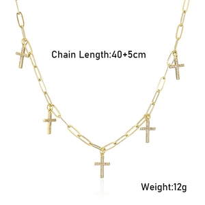 Detail of gold-plated paperclip chain necklace with zircon cross pendants, 40+5cm length