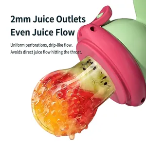 Dinosaur-shaped baby fruit feeder with 2mm juice holes and fresh fruit pieces