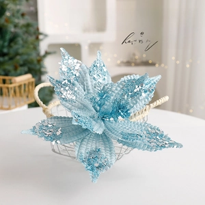 Light blue velvet poinsettia Christmas flower with silver glitter for tree decoration
