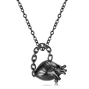 Gothic anatomical heart pendant necklace in gunmetal black finish on white background