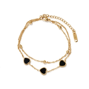 Double-layered golden stainless steel bracelet with three black heart-shaped pendants