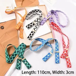Close-up of adjustable chevron knit straps in various colors with metal buckles
