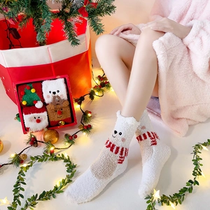 Cozy Christmas fuzzy socks for women, thick warm coral fleece winter gift socks with cute designs.