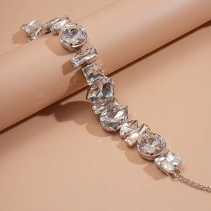 Luxury silver bracelet with mixed cut crystal stones in square and drop shapes