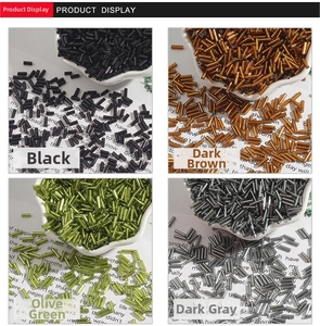 Macro display of 2x7mm silver-lined glass tube beads in black, brown, green, and grey colors