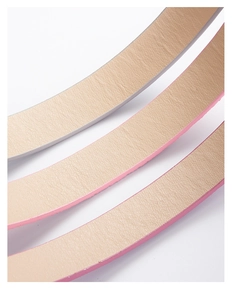 Detail of children's PU leather belt showing pink edge oil and beige lychee texture