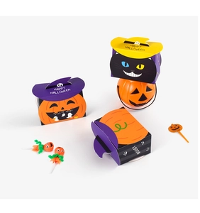 Colorful pumpkin and black cat Halloween candy gift boxes with festive slogans and decorations