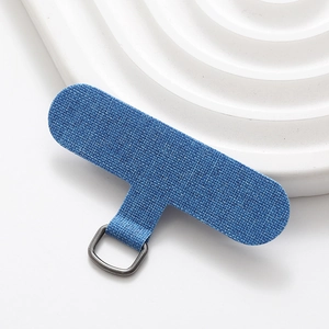 Close-up of blue fabric T-shape phone lanyard tether tab with a grey metal D-ring loop