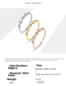 Macro detail of S925 sterling silver wavy rings with zircon in gold and rose gold finishes