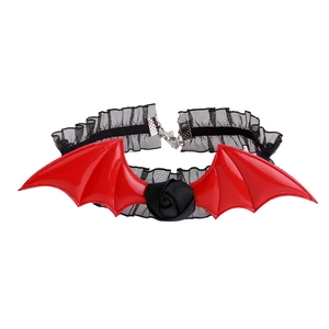 Detailed view of gothic lace choker featuring red bat wings and a 3D black rose motif