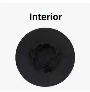 Detail view of the breathable inner lining and sweatband of the black sun hat