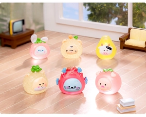 Close-up of cute luminous resin zodiac animal figurines with fruit designs