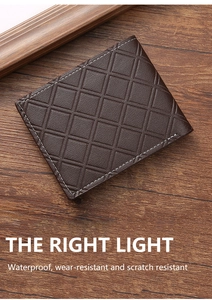Detail of dark brown leather wallet showing checkerboard texture and white contrast stitching