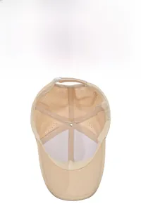 Detail view of breathable khaki baseball cap lining with ventilation holes and adjustable strap