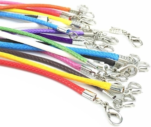 Detail showing colorful 1.5mm braided wax cords with metallic lobster clasps for jewelry