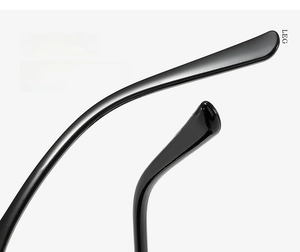 Detail of glossy black curved sunglasses temple with sleek minimalist design