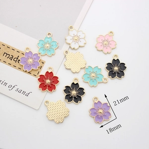 Colorful cherry blossom enamel charms for DIY jewelry making in multiple vibrant colors