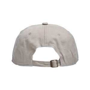 Detail view of adjustable strap with bronze metal buckle on washed cotton baseball cap